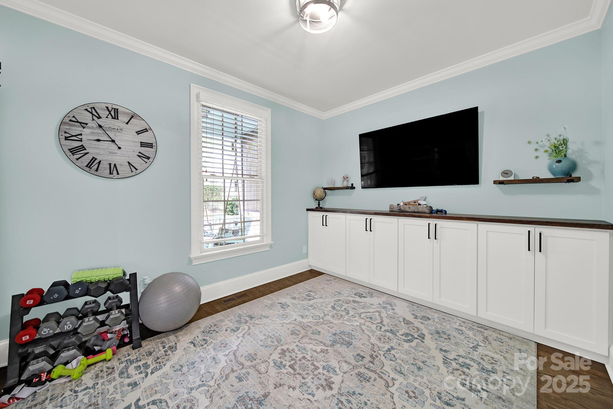 110 Sonnys Way Fort Mill, SC 29708 - Photo 10 of 48 a living room with furniture and a flat screen tv