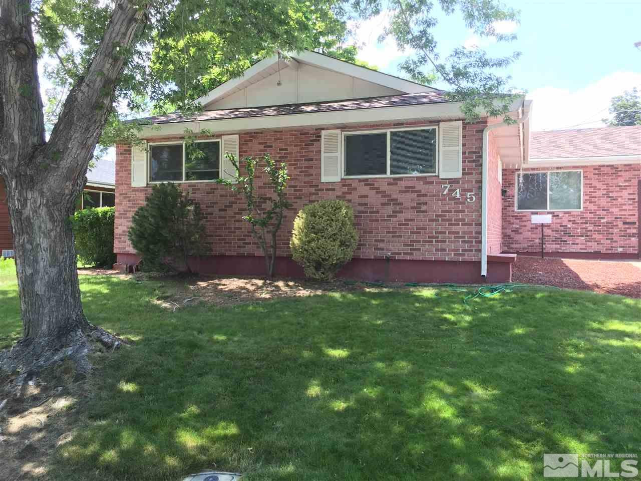 745 Beldon Way Reno, NV 89503 - Photo 1 of 1 a front view of a house with a yard