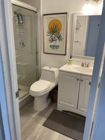 a living room with furniture and garden view