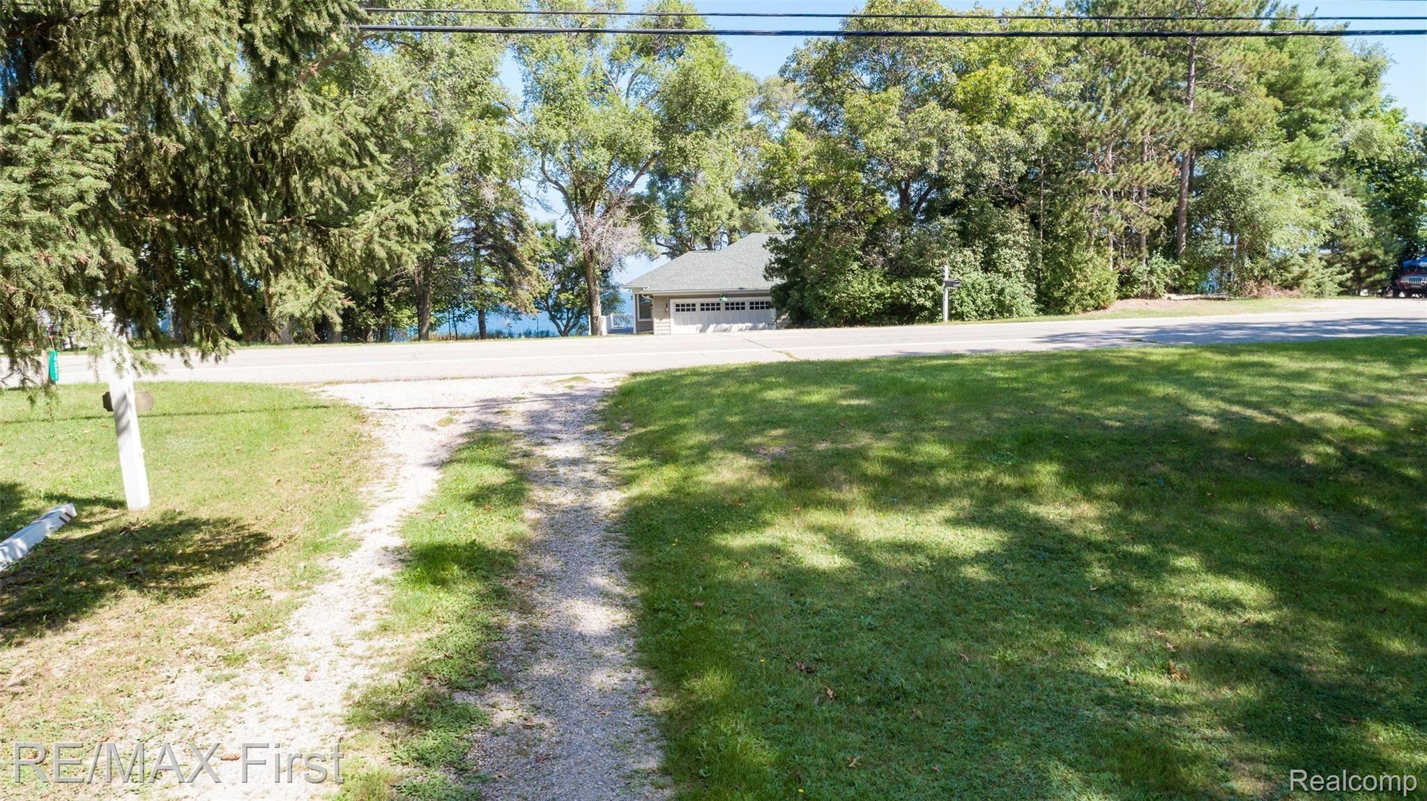 4521 Port Austin Road Caseville, MI 48725 - Photo 24 of 35 Driveway, Port Austin Rd view of Lake Huron