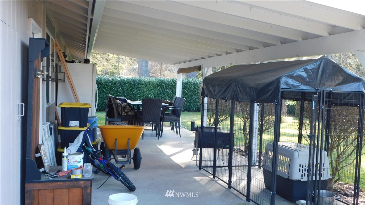 18419 Nutmeg Street Southwest Rochester, WA 98579 - Photo 19 of 24 an outdoor sitting area with couch and outdoor view