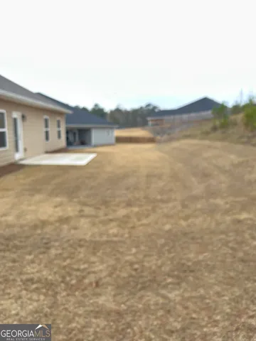 a house view with a outdoor space
