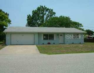 3378 Papaya Road Venice, FL 34293 - Photo 1 of 1 a front view of a house with a garden