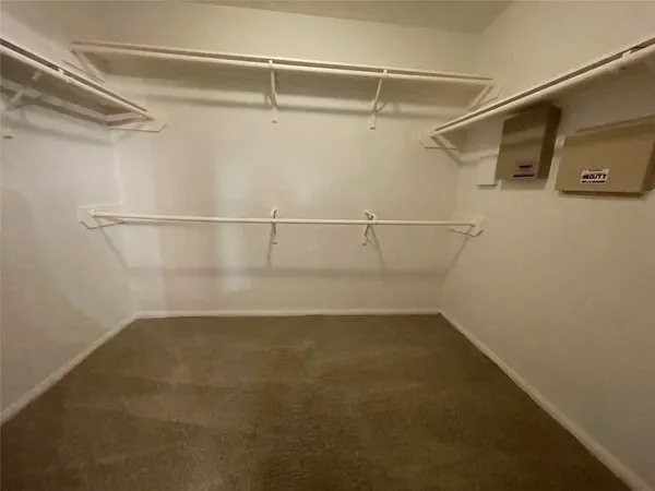 a view of a room with racks on the wall