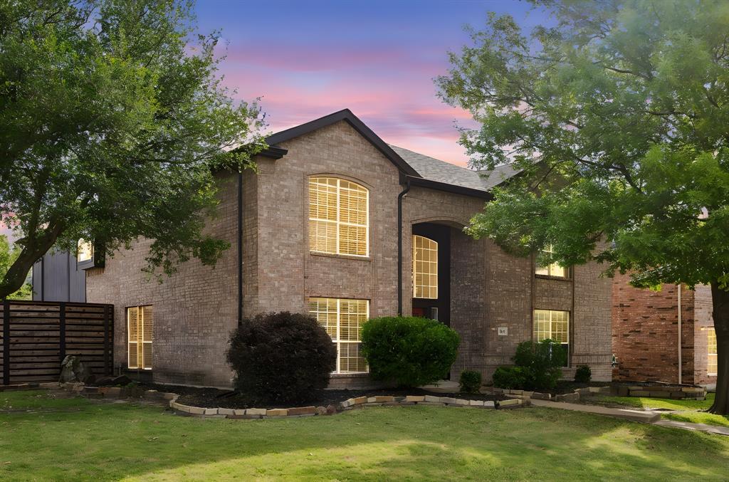 584 Pendleton Drive Rockwall, TX 75032 - Photo 28 of 28 a front view of a house with a yard and a tree