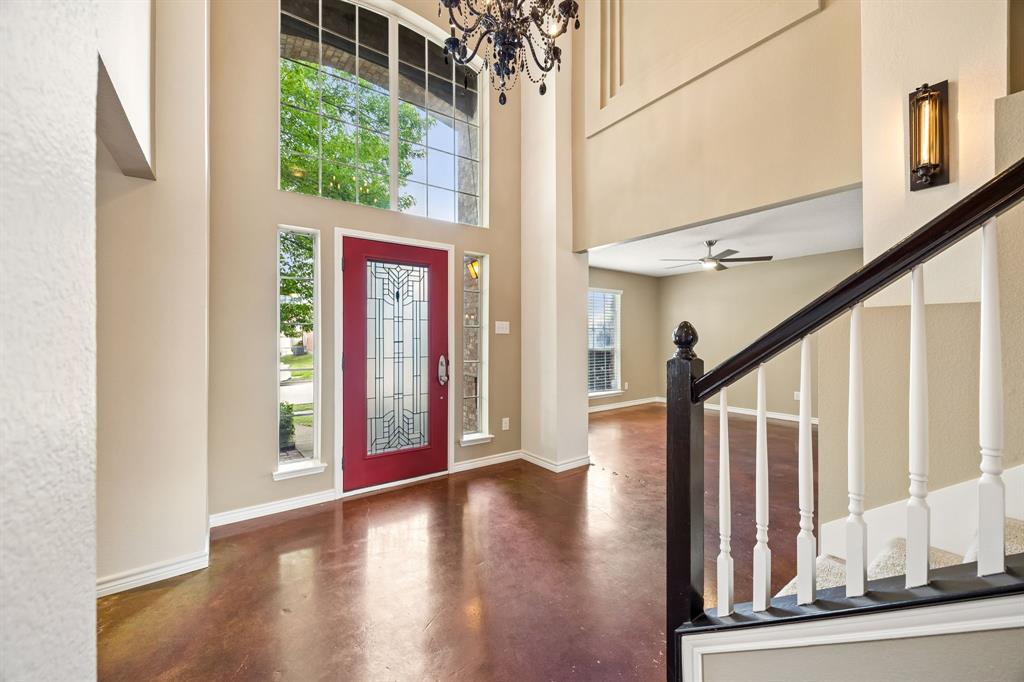 584 Pendleton Drive Rockwall, TX 75032 - Photo 4 of 28 a view of entryway with wooden floor and stairs