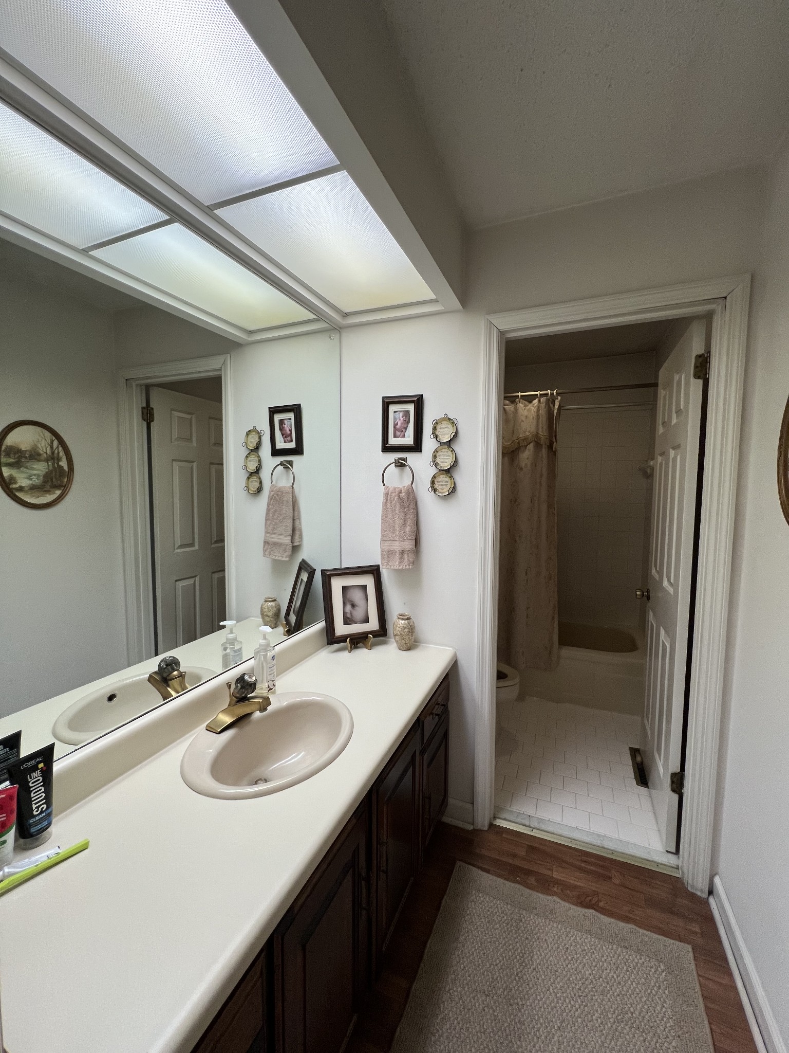 4555 Gamaliel Road Red Boiling Springs, TN 37150 - Photo 10 of 25 a bathroom with a sink double vanity and a mirror
