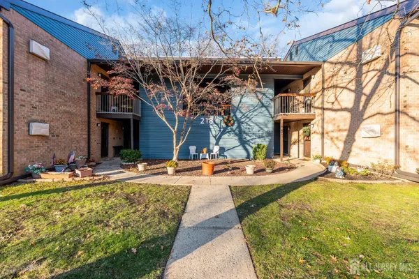 a view of a house with swimming pool