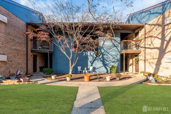 a view of a building with a yard