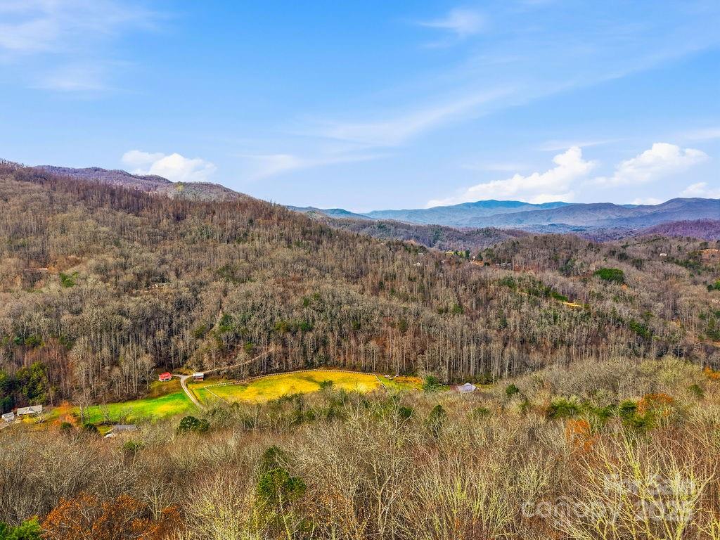 0 Barkers Creek Road Whittier, NC 28789 - Photo 7 of 25 a view of an aerial view of residential houses with swimming pool and mountain view