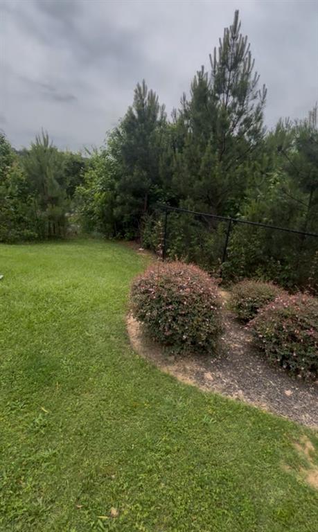 2716 Hamilton Mill Road Buford, GA 30519 - Photo 5 of 5 a view of a trees with a yard