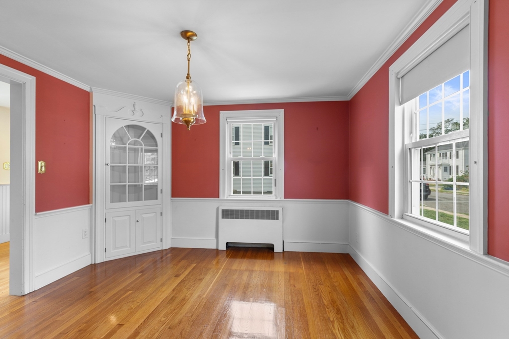 5 Sunset Road Salem, MA 01970 - Photo 11 of 32 a view of empty room with wooden floor and fan