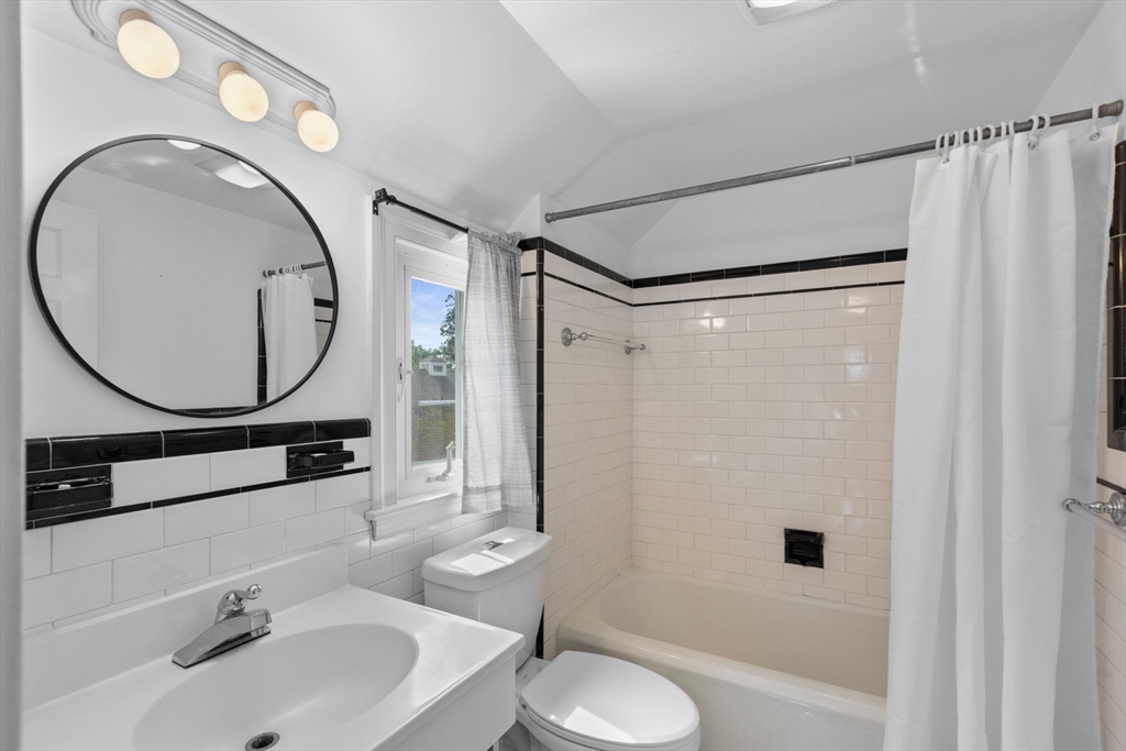 5 Sunset Road Salem, MA 01970 - Photo 22 of 32 a bathroom with a sink and a mirror