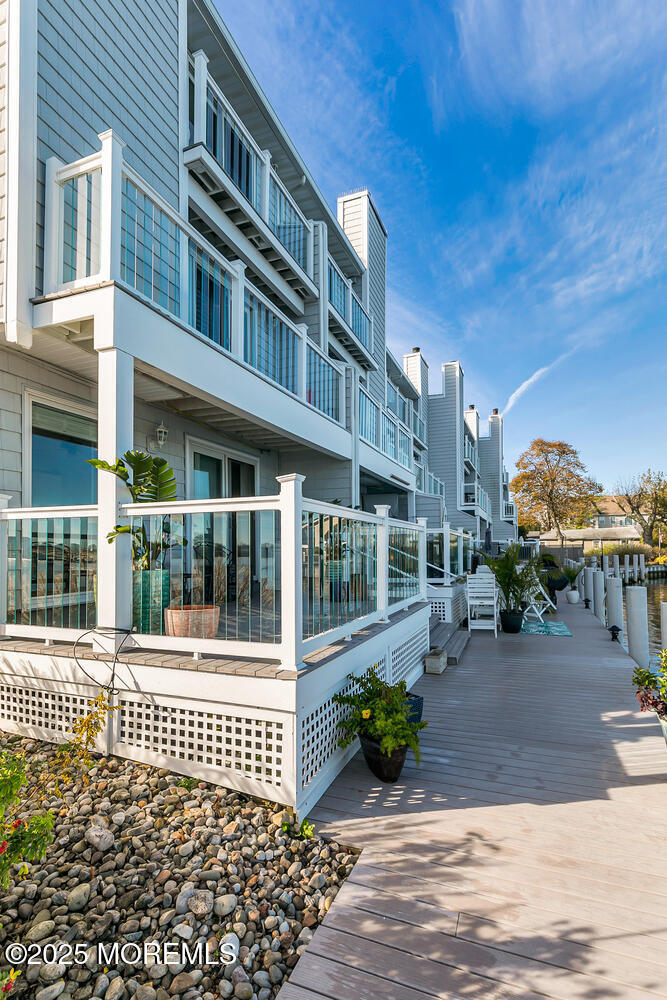 165 Riddle Avenue, Unit 7 Long Branch, NJ 07740 - Photo 11 of 87 a front view of a building with a garden