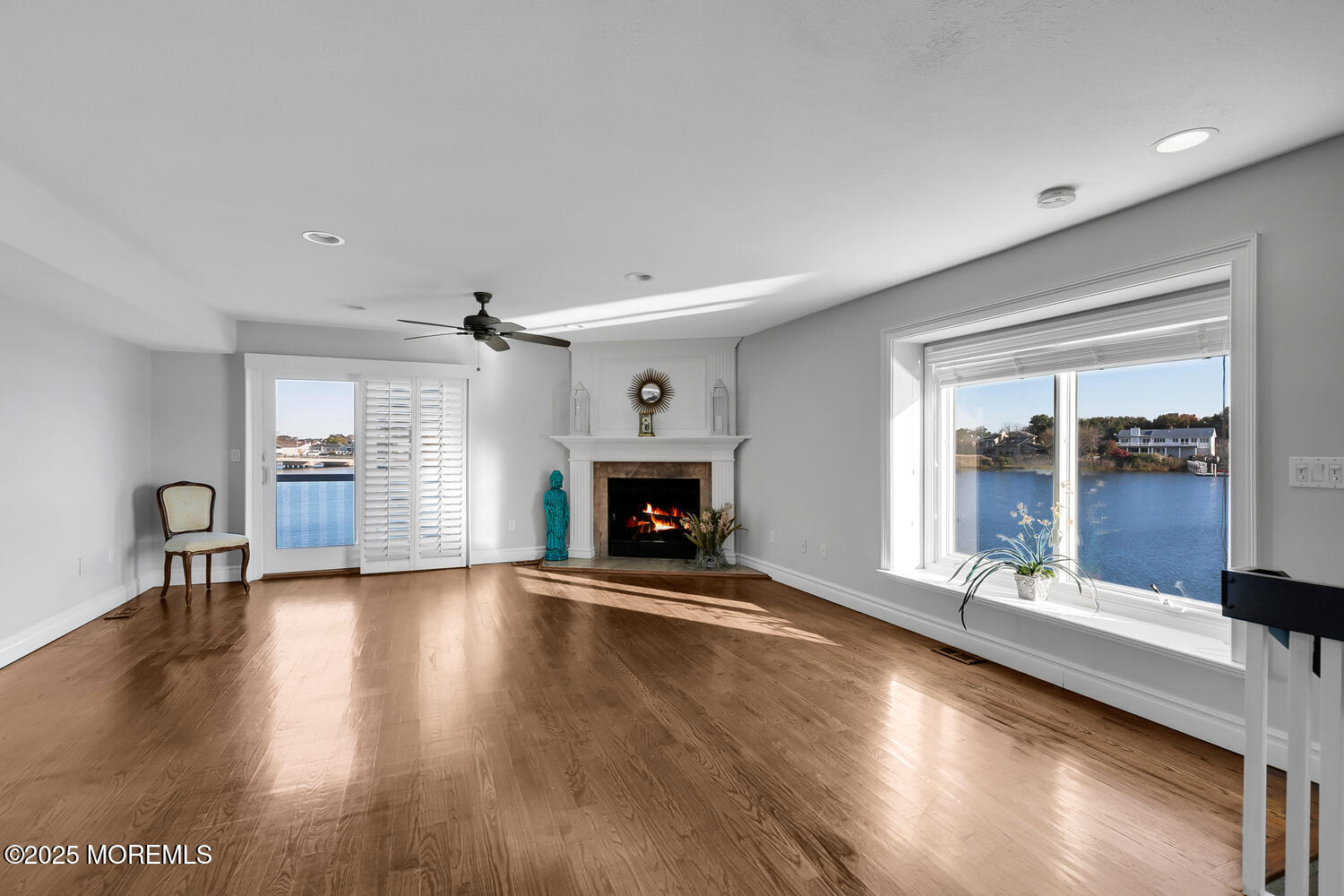 165 Riddle Avenue, Unit 7 Long Branch, NJ 07740 - Photo 18 of 87 a view of an empty room with window and fire place
