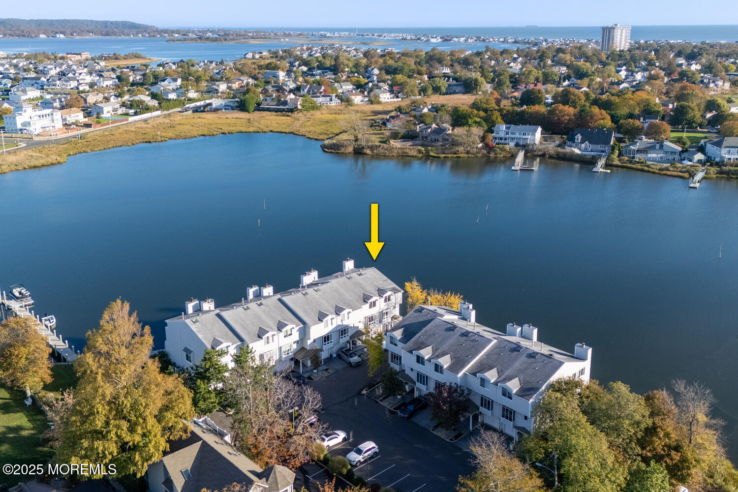 165 Riddle Avenue, Unit 7 Long Branch, NJ 07740 - Photo 2 of 87 an aerial view of a houses with a lake
