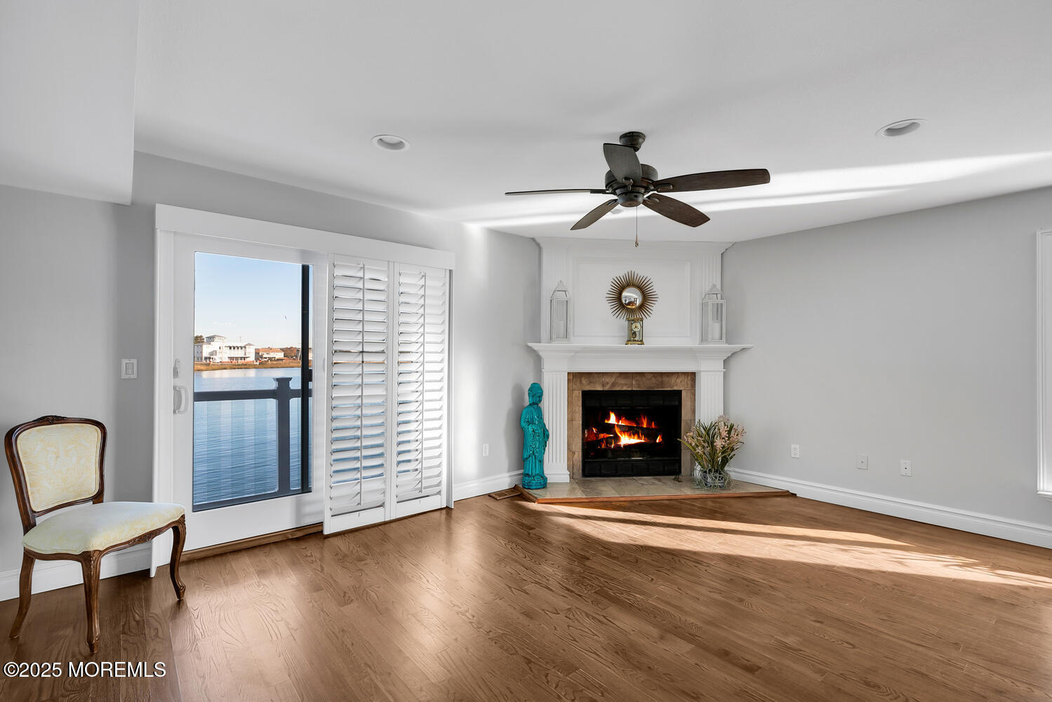 165 Riddle Avenue, Unit 7 Long Branch, NJ 07740 - Photo 21 of 87 a living room with furniture and a fireplace