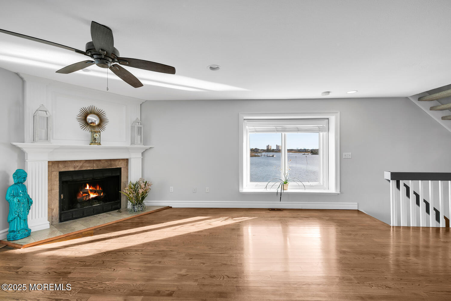 165 Riddle Avenue, Unit 7 Long Branch, NJ 07740 - Photo 22 of 87 a view of an empty room with exposed radiator and fireplace
