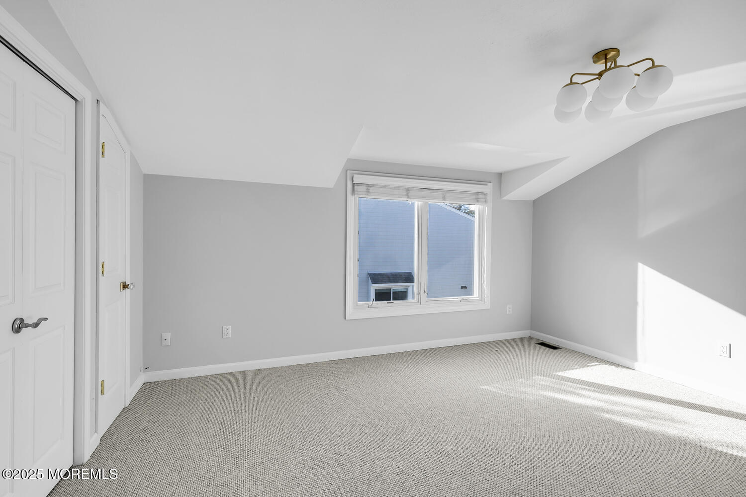 165 Riddle Avenue, Unit 7 Long Branch, NJ 07740 - Photo 35 of 87 a view of an empty room with a window