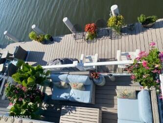 165 Riddle Avenue, Unit 7 Long Branch, NJ 07740 - Photo 43 of 87 a front view of a house with a garden