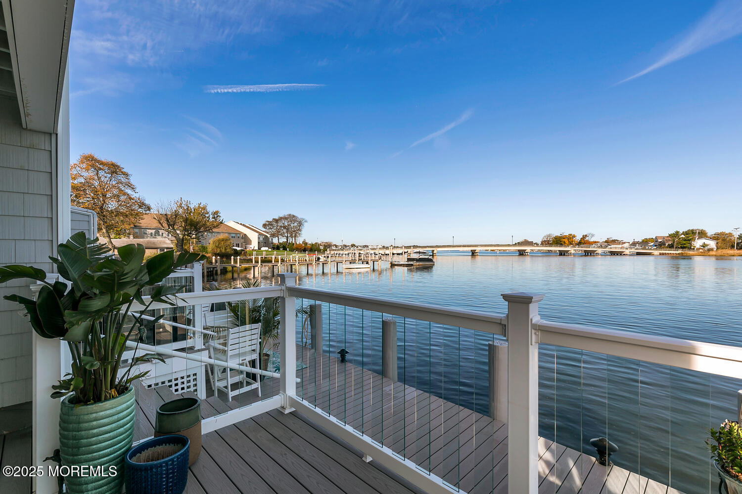165 Riddle Avenue, Unit 7 Long Branch, NJ 07740 - Photo 47 of 87 a view of a balcony with wooden floor space and outdoor seating