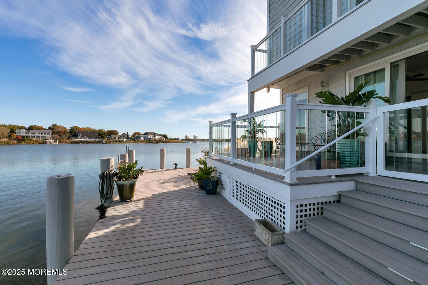165 Riddle Avenue, Unit 7 Long Branch, NJ 07740 - Photo 48 of 87 a view of a roof deck with couches and wooden floor