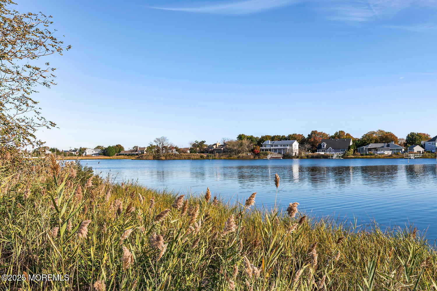 165 Riddle Avenue, Unit 7 Long Branch, NJ 07740 - Photo 55 of 87 a view of a lake with houses in the background
