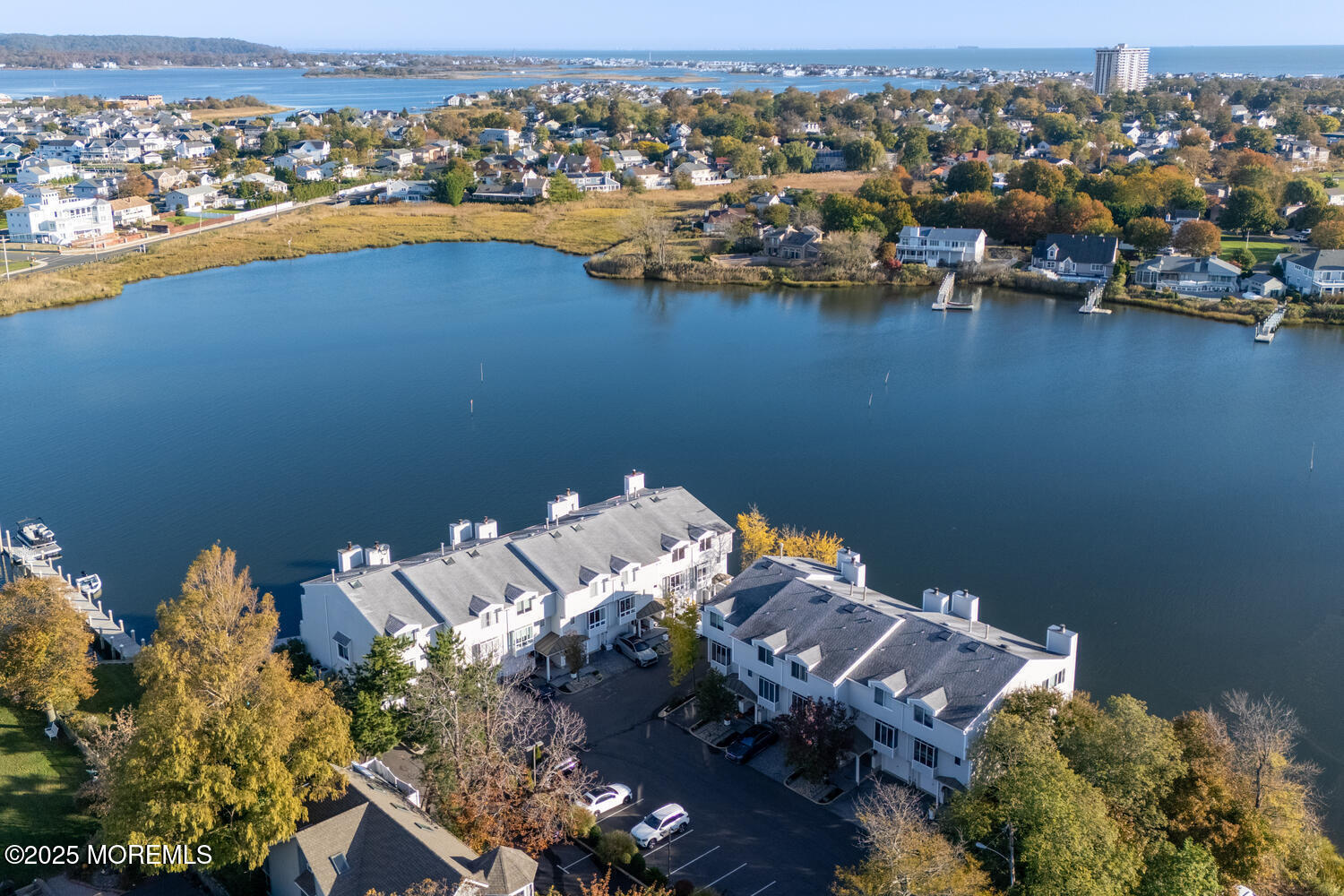 165 Riddle Avenue, Unit 7 Long Branch, NJ 07740 - Photo 56 of 87 an aerial view of a houses with a lake