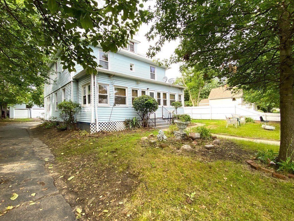 40 Marshall Street Springfield, MA 01109 - Photo 3 of 14 a front view of house with yard