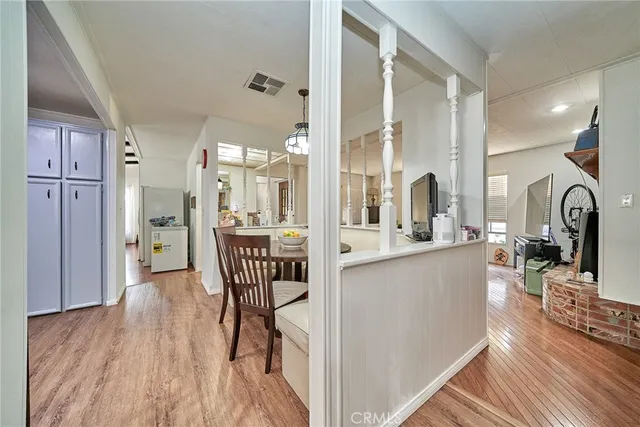 a view of a kitchen from the dinning room