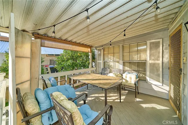 a outdoor space with a couch and chairs