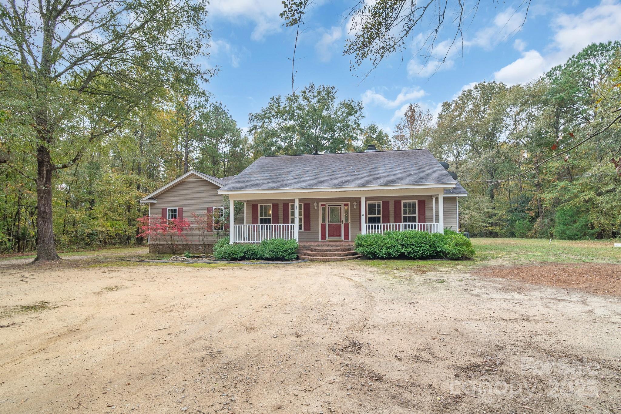 443 State Rd S-28-101 Elgin, SC 29045 - Photo 35 of 45 a front view of a house with a yard