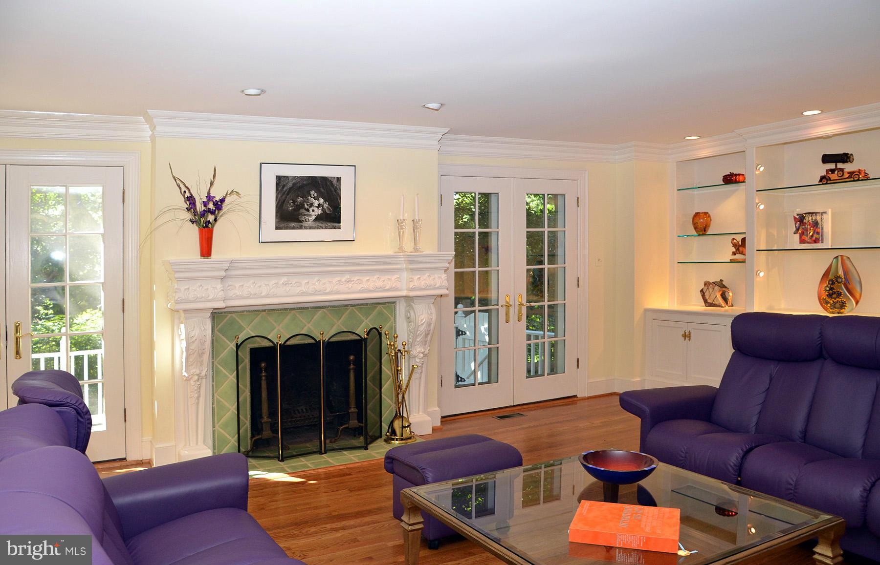 7011 Holyrood Drive McLean, VA 22101 - Photo 12 of 30 a living room with furniture and a fireplace