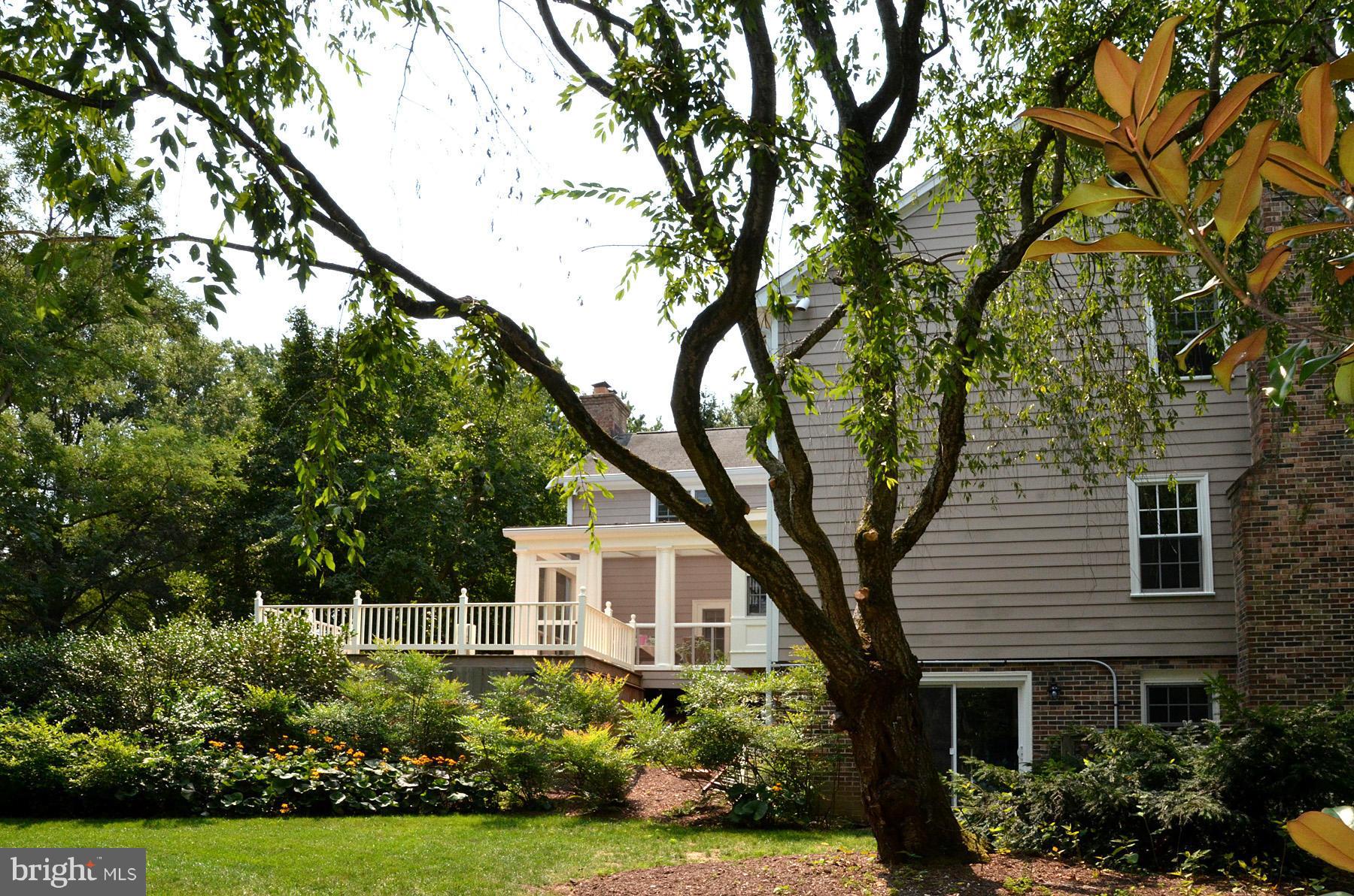 7011 Holyrood Drive McLean, VA 22101 - Photo 20 of 30 a front view of a house with a yard