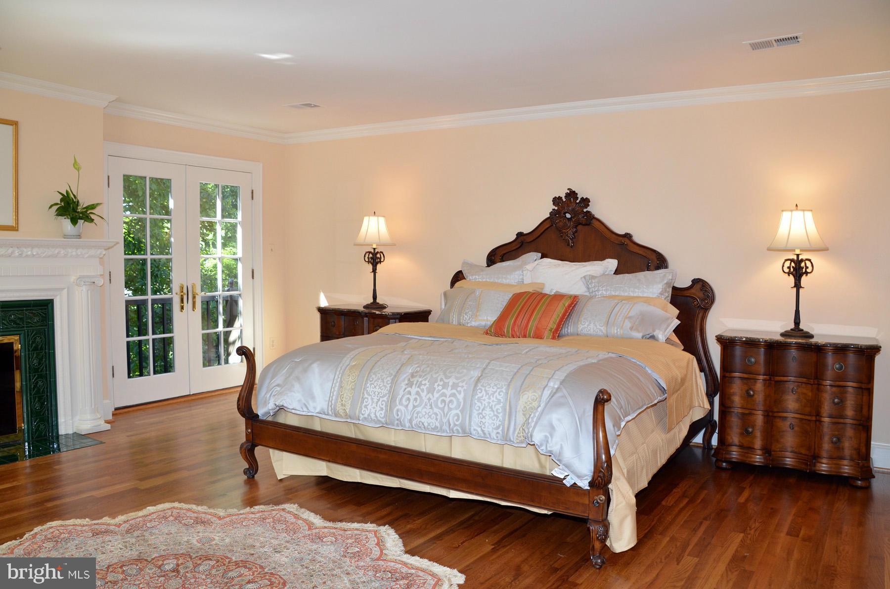 7011 Holyrood Drive McLean, VA 22101 - Photo 23 of 30 a bedroom with bed and wooden floor