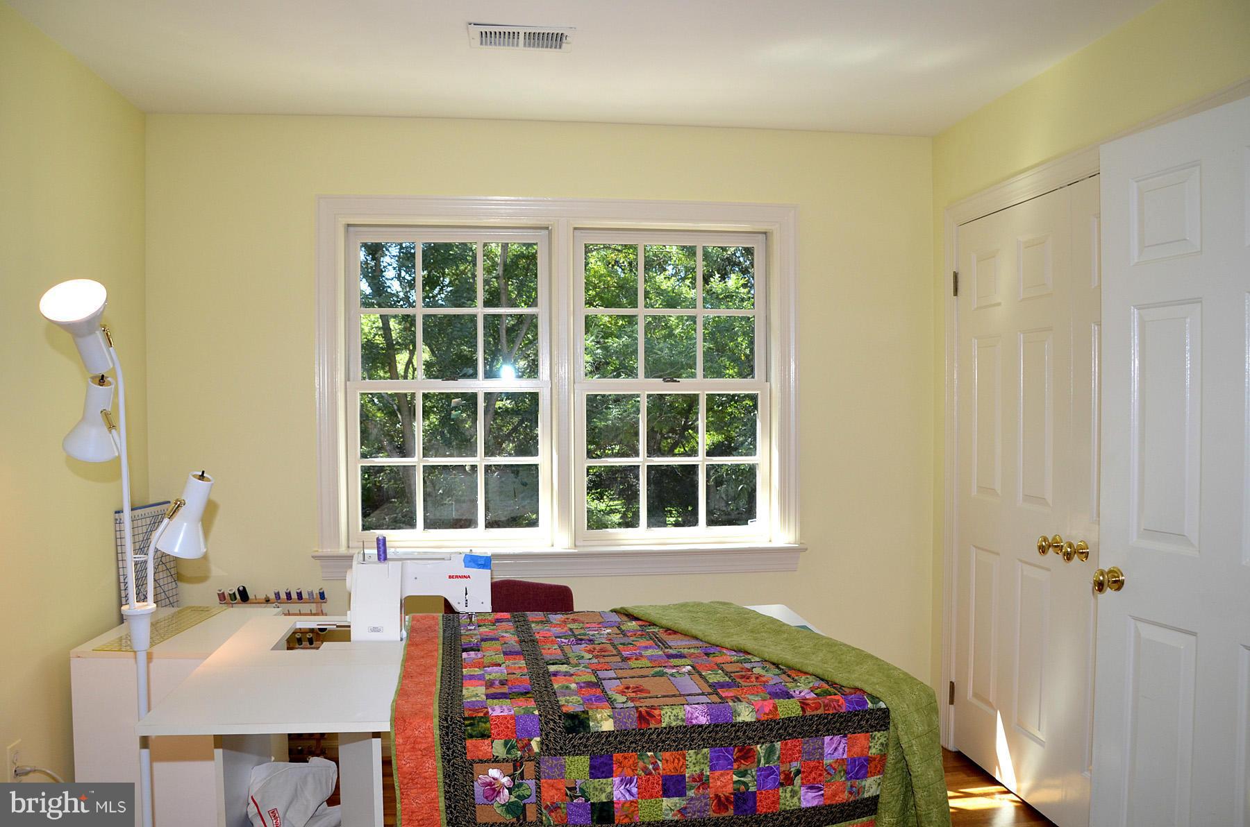 7011 Holyrood Drive McLean, VA 22101 - Photo 29 of 30 a bedroom with a bed and a window