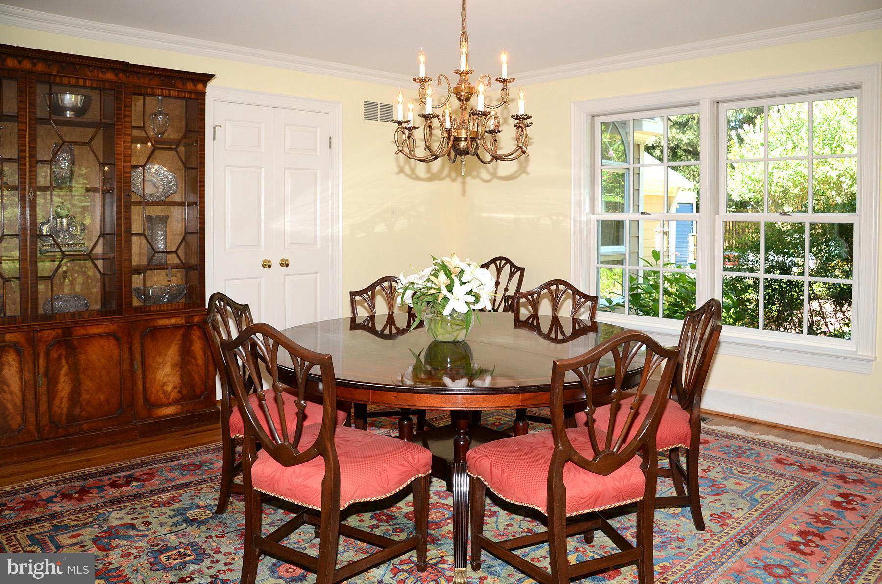 7011 Holyrood Drive McLean, VA 22101 - Photo 6 of 30 a view of a dining room with furniture window and outside view
