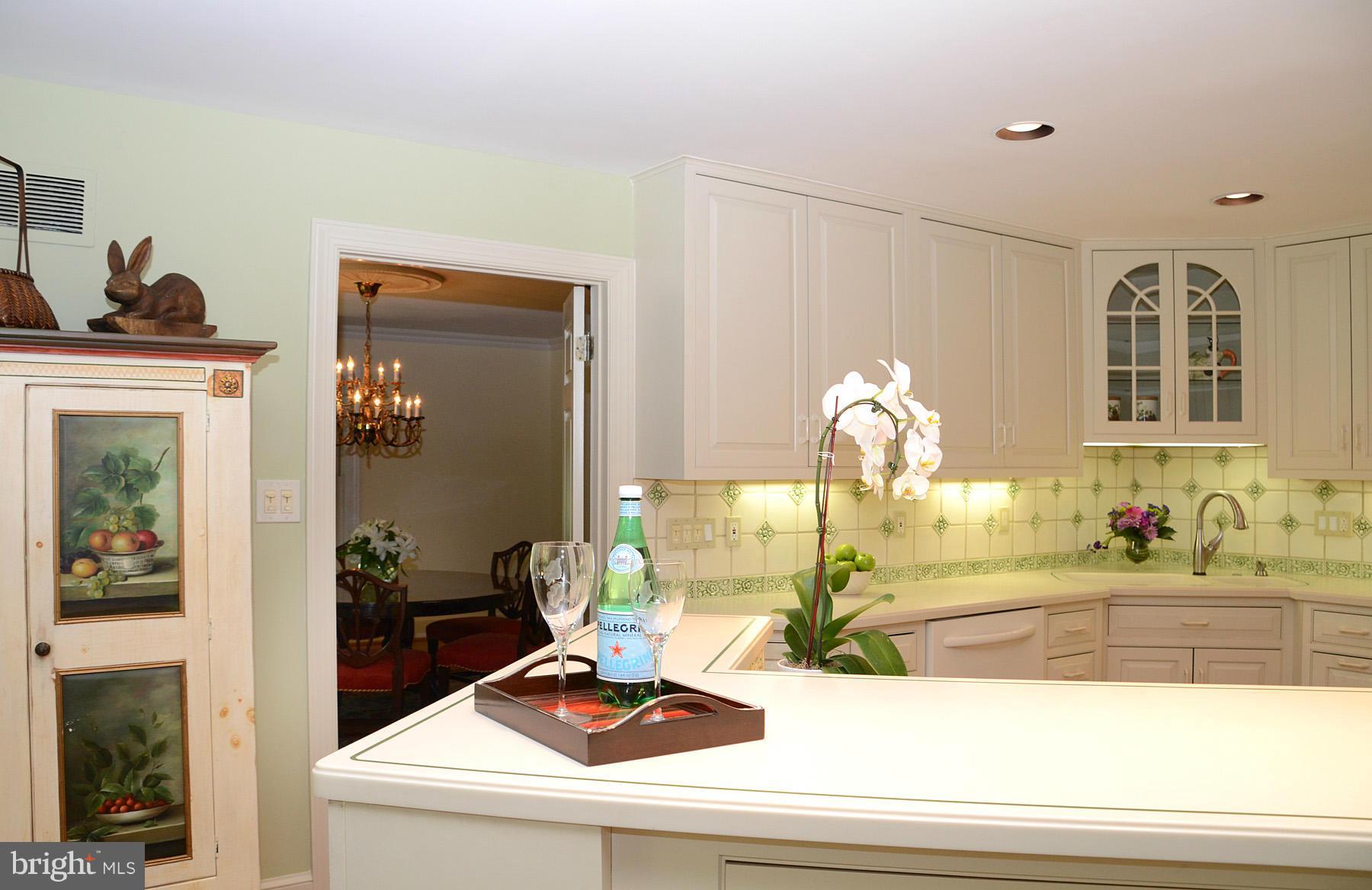 7011 Holyrood Drive McLean, VA 22101 - Photo 8 of 30 a bathroom with a sink and a mirror