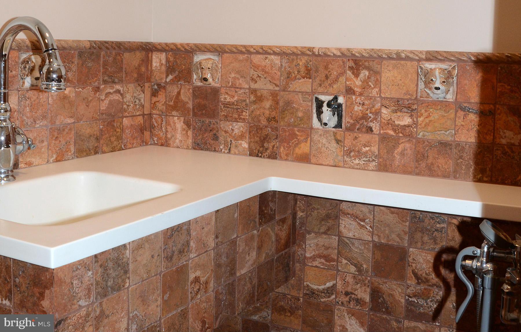 7011 Holyrood Drive McLean, VA 22101 - Photo 10 of 30 a bathroom with a bathtub and shower