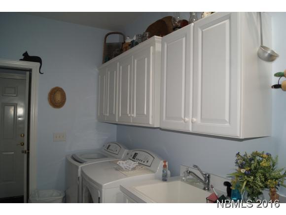 120 Mellen Road New Bern, NC 28562 - Photo 29 of 54 Cabinetry in Laundry Room