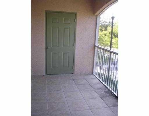 6838 West Sample Road, Unit 6838 Coral Springs, FL 33067 - Photo 9 of 16 Balcony with extra storage room