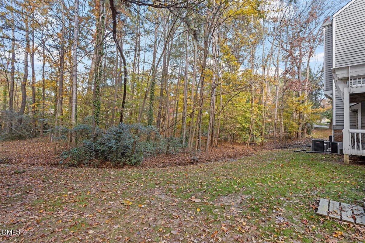 100 Hunting Chase, Unit 1D Cary, NC 27513 - Photo 7 of 29 a view of a yard with large trees