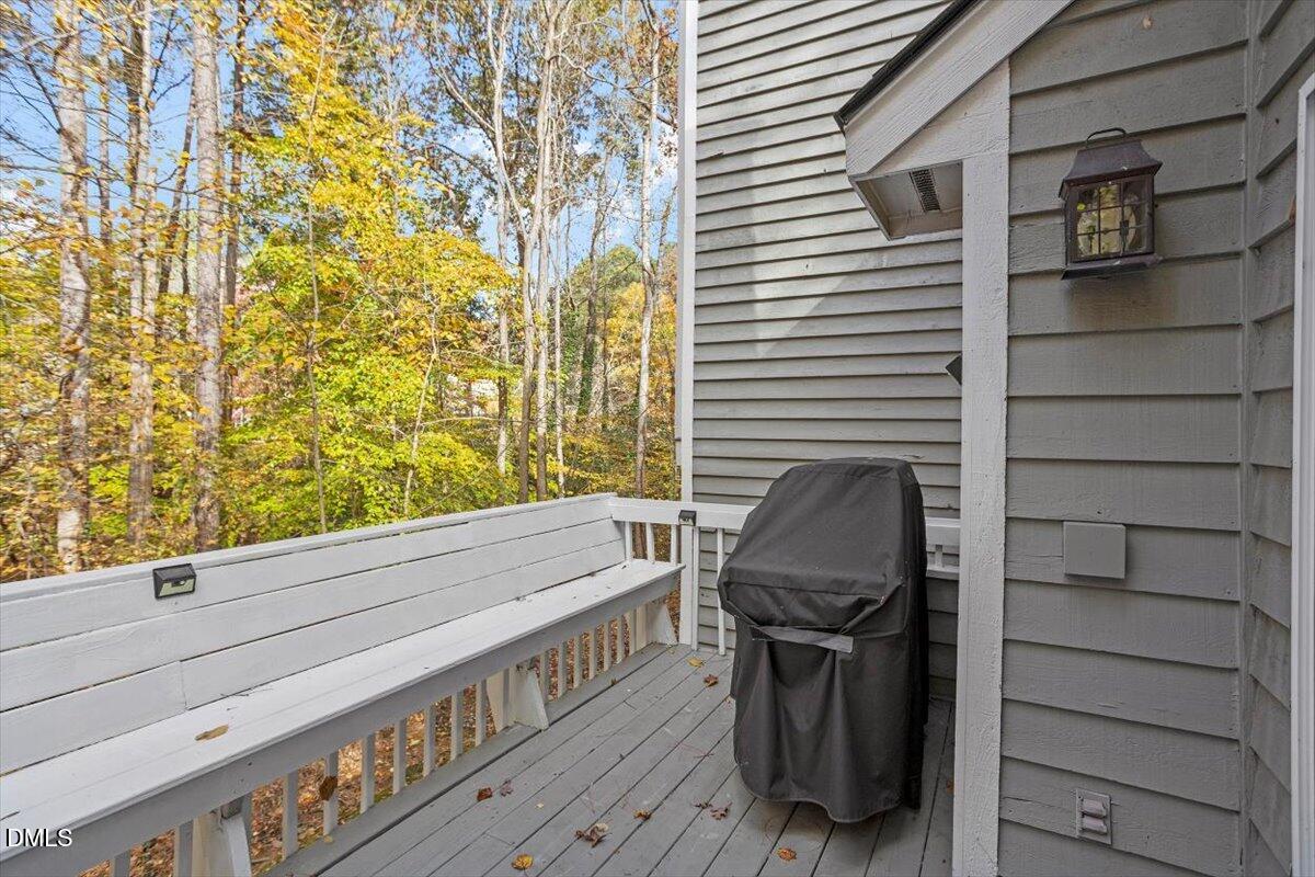 100 Hunting Chase, Unit 1D Cary, NC 27513 - Photo 8 of 29 a view of a balcony with chairs