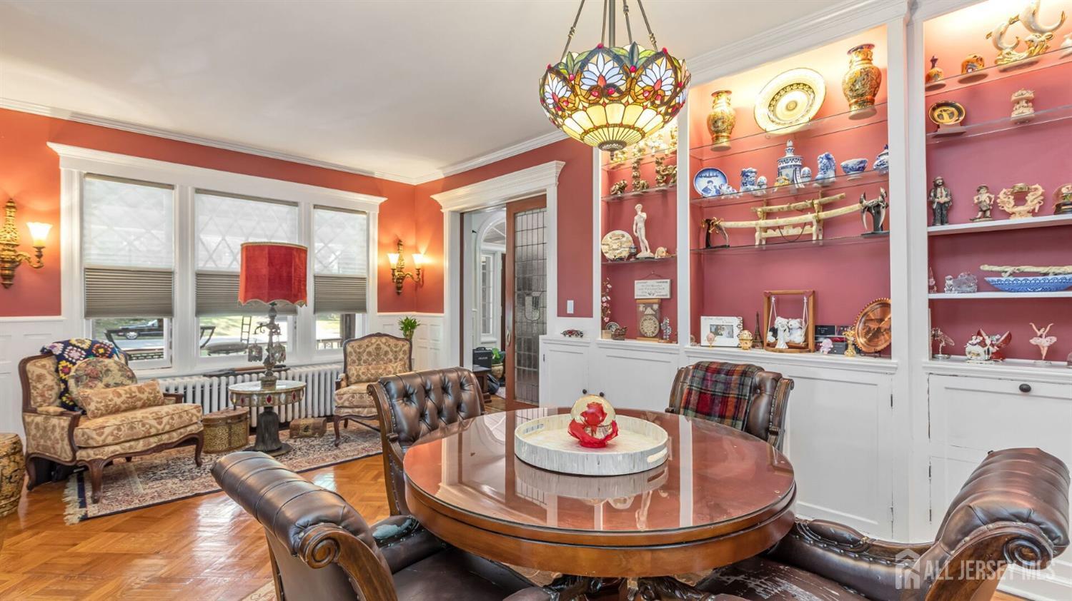 1275 Denmark Road Plainfield, NJ 07062 - Photo 25 of 87 a living room with furniture and a chandelier