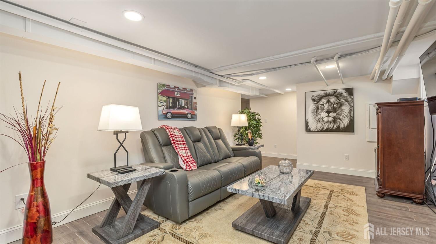 1275 Denmark Road Plainfield, NJ 07062 - Photo 31 of 87 a living room with furniture and a rug