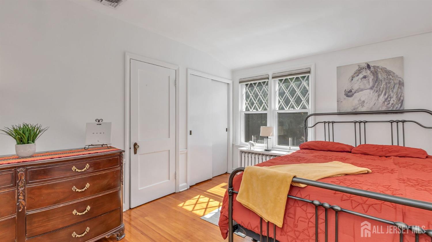 1275 Denmark Road Plainfield, NJ 07062 - Photo 39 of 87 a bedroom with a bed and a window