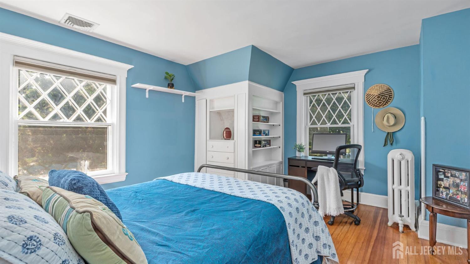 1275 Denmark Road Plainfield, NJ 07062 - Photo 45 of 87 a bedroom with a bed and a window