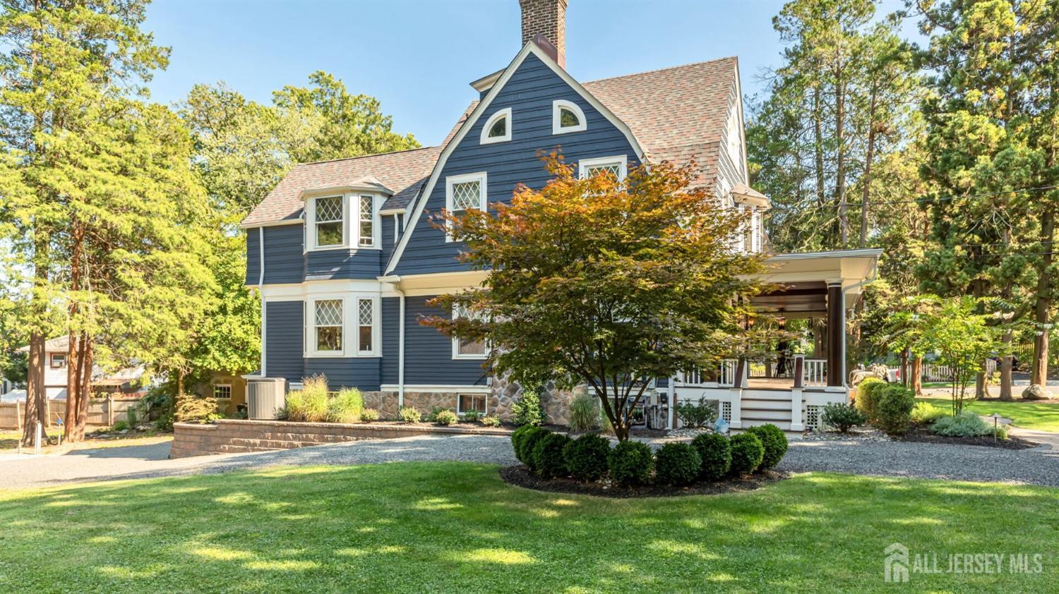 1275 Denmark Road Plainfield, NJ 07062 - Photo 69 of 87 a front view of a house with a garden