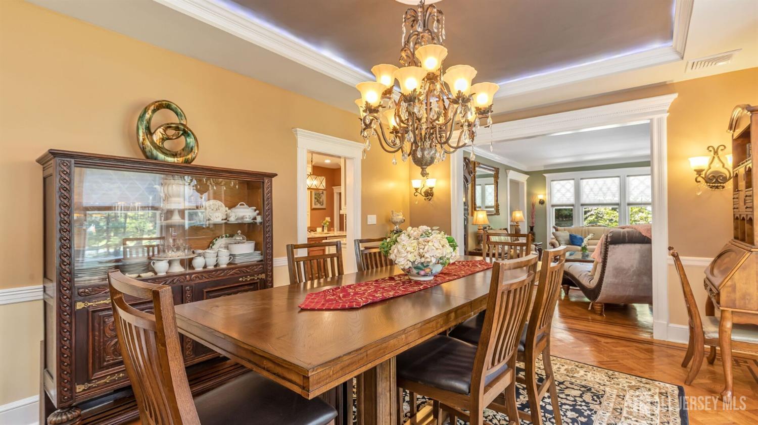 1275 Denmark Road Plainfield, NJ 07062 - Photo 10 of 87 a view of a dining room with furniture wooden floor and chandelier