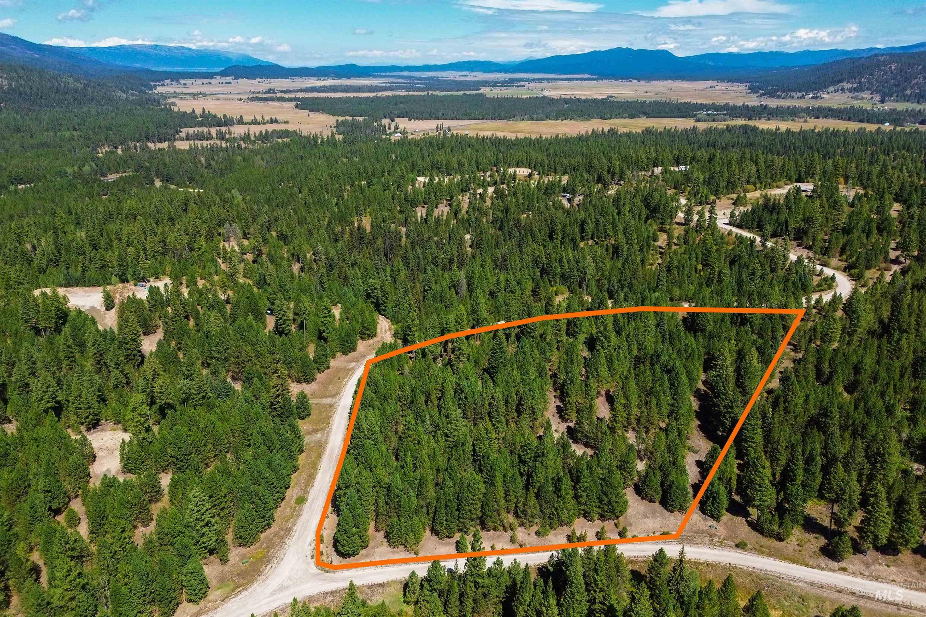 47 Coit Drive Cascade, ID 83611 - Photo 16 of 20 Aerial view of property's location with a mountainous background and property boundaries highlighted